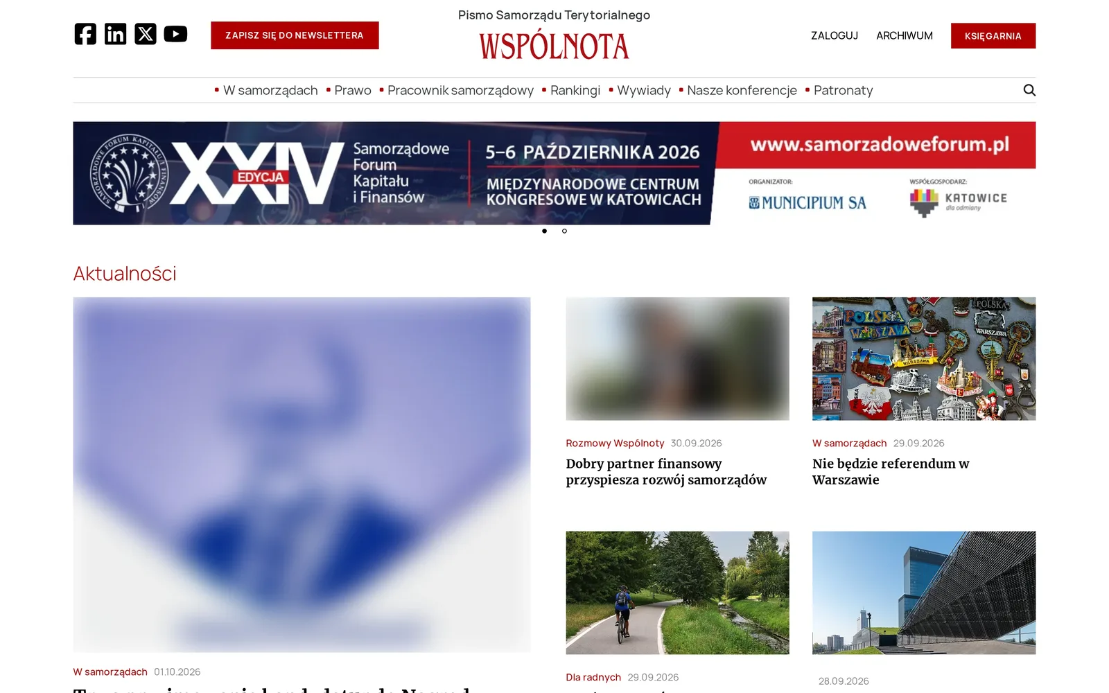 Strona główna „Wspólnoty” na komputerze: czerwone logo pisma, przycisk zapisu do newslettera, księgarnia, menu siedmiu działów, baner Samorządowego Forum Kapitału i Finansów i początek aktualności